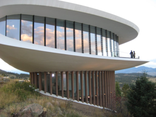 Designed by Charles Deaton and completed in 1965, the Sculptured House is listed on the National Register of Historic Places and can be seen clearly from Interstate 70. 