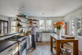 Open kitchen shelving is a wonderful place to display any kind of fancy dinnerware or family heirlooms you own that have previously been hiding behind closed cabinets.