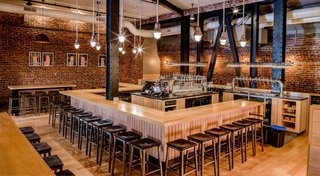 The space was created through a collaboration between founder Mikkel Borg Bjergsø and entrepreneur Chuck Stilphen. Housed within the original bones of a 100-year-old building, it features an open-plan bar that offers 40 taps of rare craft beers.