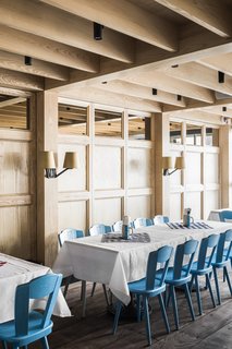 Technē Architecture + Interior Design broke the space up into three divided zones—the traditional dining hall, a private function room (shown here), and outside seating areas.