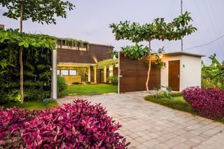 Located in a peaceful residential area and surrounded by lush paddy fields, this three-bedroom house is made out of shipping containers and has a sunken outdoor conversation pit that’s perfect for evening cocktails.