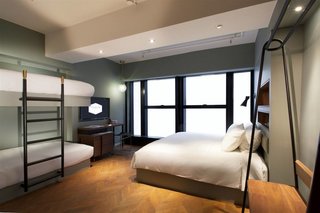 10 Modern and Stylish Places to Stay in Hong Kong - Photo 7 of 10 - Working in collaboration with talented local and expat artists and designers, Tribute Hotel brings thoughtful details into their modern art deco-inspired guest rooms—including artisanal ceramics, lighting, lip balms, and soaps.