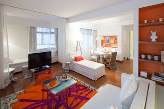 10 Modern and Stylish Places to Stay in Hong Kong - Photo 4 of 10 - Originally designed by Philippe Starck in 2004, J Plus Hotel by YOO celebrated its 10th anniversary in 2014 with a whole new refreshed image that was put in place by YOO Studio. The makeover included the addition of colorful textiles, eclectic furnishings, and playful, symbolic works of art. 