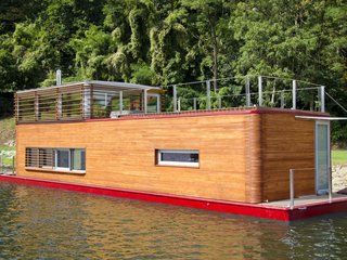 This full-fledged floating house was designed with features that are meant to live comfortably year-round.