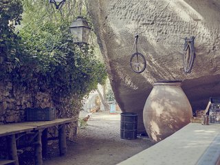 The Maurons have occupied the quarry outside Saint-Rémy-de-Provence for more than 400 years. It was Lolo and his late father who had the idea to turn the caves into a reservation-only table d’hôte and dish up old family recipes. 