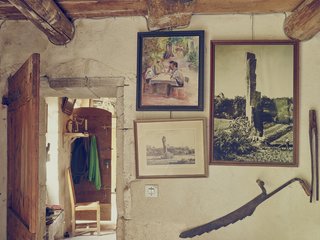 The quarry is known for a 65-foot stone pillar, seen in photos in the den, that was chiseled by miners. 