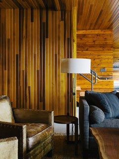 An Eclectic Pacific Northwest Cottage - Photo 8 of 13 - A Workstead lamp is beside a custom sectional covered in Zak+Fox fabric.