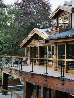 An Eclectic Pacific Northwest Cottage - Photo 11 of 13 - Conrad used sprinkler pipe material for the railings on the deck, which is made of ipe from West Wind Hardwood.