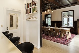 This New Old House - Photo 1 of 10 - Jens Martin Skibsted salvaged an 1890s house just outside of Copenhagen, reworking it with architect Jürgen Mayer H. The structure is a retreat for Jens, his wife, Naomi, and their children. The dining table was designed by him to accommodate 18; the legs were produced by HAY, as were the Shanghay molded plywood chairs. "The house has so many things," explains Jens. "Every corner has a story."