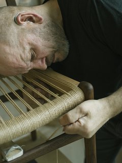 Warp Speed - Photo 9 of 12 - 3. First Course The cord is then woven front to back and fastened to the L-shaped nails. Once this step is complete, the nails are hammered shut. 