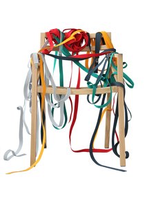 Bretelle Chair </p><p> When it’s fully dressed, Luca Martorano and Georg Muehlmann’s Bretelle chair is wrapped in colorful "suspenders." It can be customized with 160 shades of ribbon. georgmuehlmann.it
