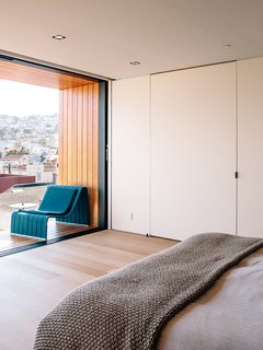 A special media door opens to reveal the bedroom’s AV system.