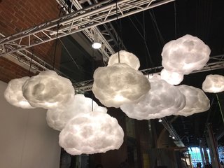 We loved this cluster of cloud-like LED fixtures by Richard Clarkson Studio—the pieces are created using hypoallergenic, flame-retardant polyester fiber. Special bonus: it's not just a lamp, it's also a speaker system that can stream any Bluetooth compatible device. Spotted at WantedDesign. 
