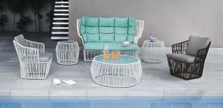 With an interesting shape made up of interwoven polyethylene strands on a tightened steel base, Kenneth Cobonpue's Calyx love seat is a comfortable conversation piece.