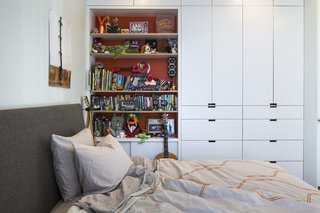 Built-in storage keeps things organized in Leo’s bedroom, which contains an Ella bed from Room & Board and an Inmod duvet. 