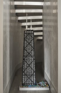 The space under the staircase houses a Lego version of the John Hancock Center by New York artist Sean Kenney. 