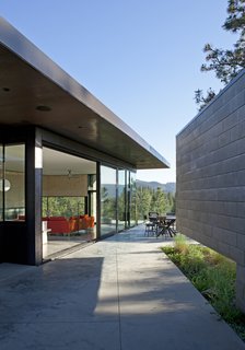 "We didn’t treat the steel," explains Jon. "We said, you know what, we’re going to let it rust. And the concrete block wall—you just sort of leave it and let it age."