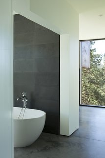 The bathtub is Aquabagno by Aquabrass.