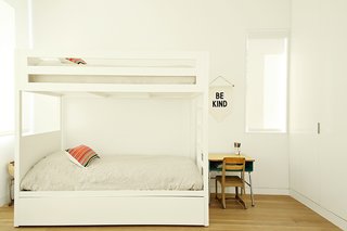 Lucas and Noah's bedroom holds a set of bunk beds by Urbangreen. 