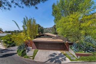 John Legend and Chrissy Teigen's Former Midcentury Home in the Hollywood Hills Is For Sale - Photo 1 of 13 -