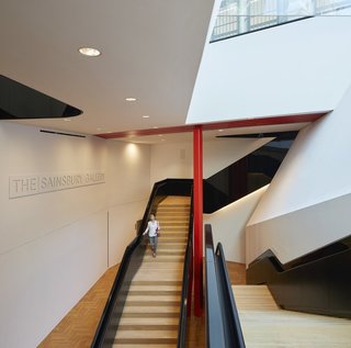 Part of an Epic Expansion, London’s V&A Museum Paves its Courtyard With 11,000 Porcelain Tiles - Photo 4 of 10 - A dramatic staircase leads to the underground gallery space.