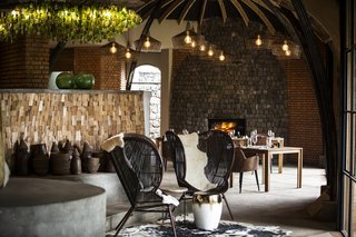 Recycled glass was used for chandeliers and black-and-white cow hides were used to reflect the rural way of life in the villages.