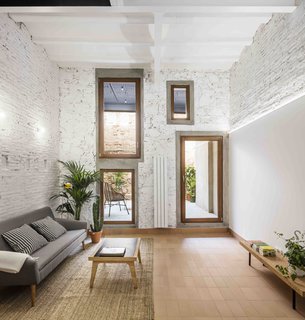 This Double-Height Apartment in
Barcelona Features Historic Details and a Floating Staircase - Photo 9 of 12 -
