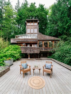 Repurposed Ship Materials and 100-Year-Old Beams Make Up This Tree House-Like Home - Photo 1 of 18 -
