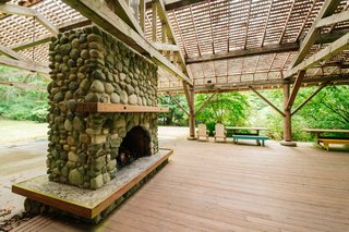 Repurposed Ship Materials and 100-Year-Old Beams Make Up This Tree House-Like Home - Photo 18 of 18 -