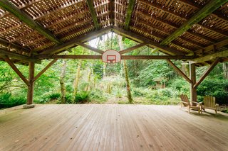 Repurposed Ship Materials and 100-Year-Old Beams Make Up This Tree House-Like Home - Photo 15 of 18 -