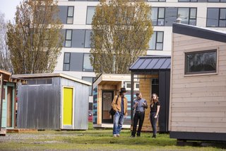 Shown here are the architect-designed PODs on display in downtown Portland. Beyond providing structures, the POD Initiative is also changing perceptions about houselessness among Portlanders so that these communities can eventually be integrated into the city's fabric. 