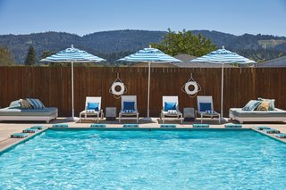 Three outdoor pools are kept at three different temperatures thanks to the 180-degree Fahrenheit mineral hot springs bubbling underground. A fire pit, bocce court, games, and hammocks are perfect places for guests to hang out.
