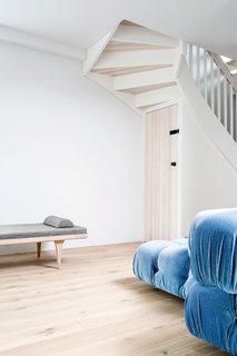 A Family’s Loft in Poland Gets a Minimalist Renovation That’s Both Elegant and Functional - Photo 10 of 12 -