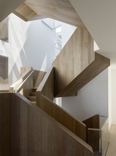A Historic Victorian in San Francisco Is Meticulously Transformed Into a Modern Family Home - Photo 10 of 26 - The striking interior stair was originally designed as a light well to filter light from above deep into the interior space.