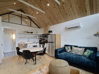 Feel at Home While Exploring Austin at One of These Modern Short-Term Rentals - Photo 4 of 17 - This 450-square-foot studio sleeps two people and features tall, exposed-wood ceilings with an A-shaped clerestory window that floods the interior with light.