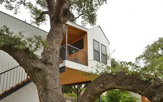 Feel at Home While Exploring Austin at One of These Modern Short-Term Rentals - Photo 5 of 17 - The studio is surrounded by large oak trees and offers expansive views of the surrounding rooftops. 