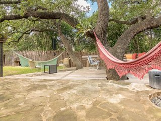 Feel at Home While Exploring Austin at One of These Modern Short-Term Rentals - Photo 17 of 17 - Connected to the main house by a breezeway, guests are able to enjoy the central outdoor space shared by the two homes. 