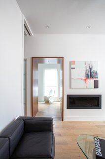 Clad in Cedar and Metal, an Indianapolis Home Gives a Modern Salute to its Traditional Surroundings - Photo 2 of 11 -