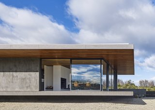 The living area floats atop a deeply recessed steel-reinforced concrete block structure. Styled by Julia Landgren