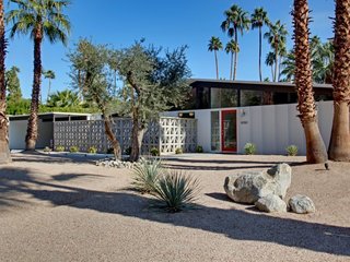 Also designed by William Krisel, this restored midcentury-modern home was built by the Alexander Construction Company in 1959. It features vaulted tongue-and-groove ceilings, porcelain tile floors, and midcentury abstract paintings. Plus, it's home to classic designs by Warren Platner, George Nelson, and Charles and Ray Eames.