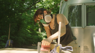 Kate Oliver sands wood for an Airstream she’s renovating in Indianapolis, Indiana.