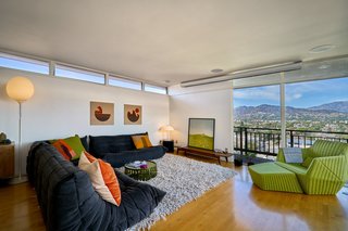 A Midcentury-Modern Home in L.A. Designed by Richard Banta Is For Sale For $899K - Photo 7 of 13 - Fixed transom windows along the more opaque walls of the living space keep the room bright.