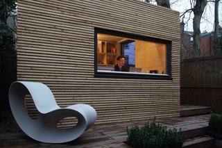 This Company Can Design, Build, and Deliver a Sustainable Prefab in Just 12 Weeks - Photo 13 of 13 - Ergonomically designed for a single person, the Ecospace WorkPod can be the ideal home studio or office on a small urban site. Installed in just around five days, WorkPods like this one, which belongs to illustrator Dana Bar, can be designed with an integrated work station, lighting, and low-energy, underfloor heating.
