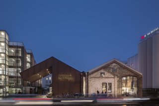 Malmö Market Hall, once a roofless and abandoned freight depot, was brought back to life as a 20-vendor market last year after siblings Nina Totté Karyd and Martin Karyd called upon Wingårdh Architects to renovate the building. The project is one of several being presented by Swedish Design Moves New York at Archtober as an example of democratic architecture. 