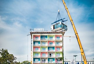 Stay in a Prefab Cube Placed Atop a Midcentury Hotel in Austria - Photo 2 of 8 -