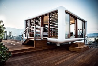 Stay in a Prefab Cube Placed Atop a Midcentury Hotel in Austria - Photo 1 of 8 -
