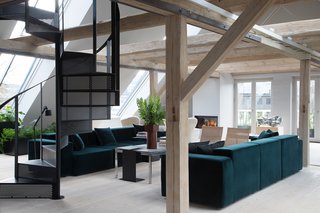 A fireplace and central heating keeps the open space warm and inviting.