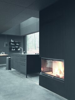 A Vipp kitchen and fireplace offer an upscale dining experience, even in the wilderness.