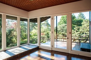 Contractor Patrick O’Neil repaired the woven Douglas fir ceiling in the foyer. 