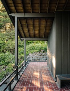 The 2,300-square-foot home’s overhangs shelter its porches. 